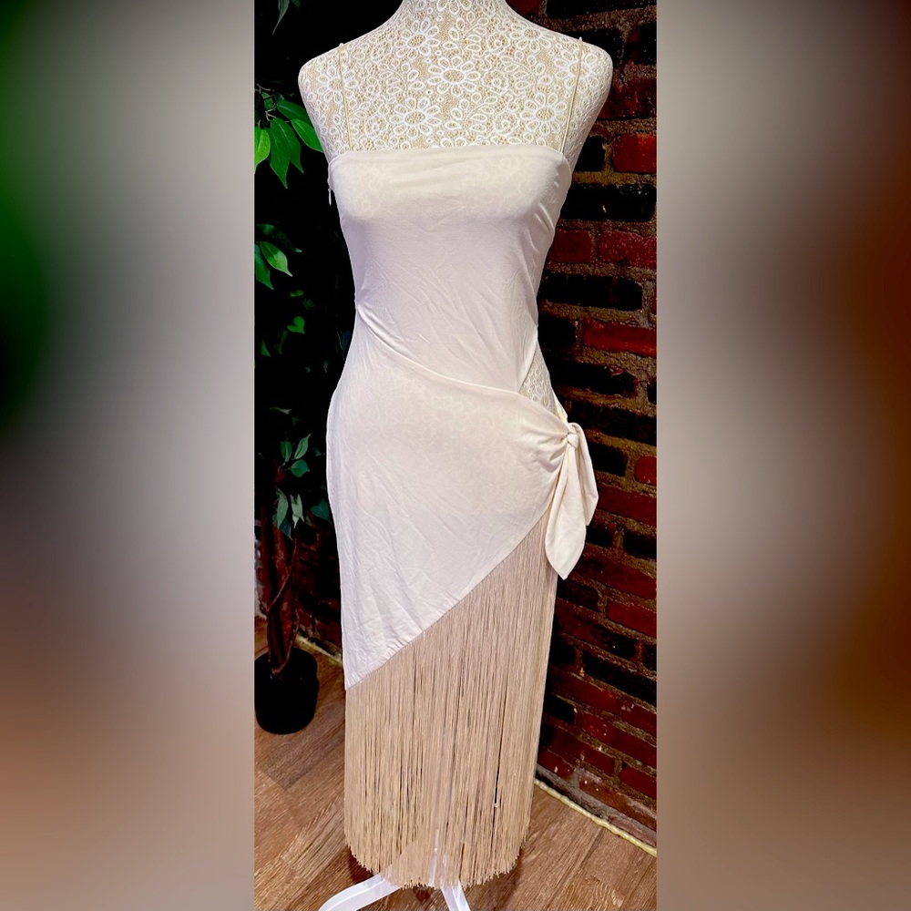 Cream body con, side knot fringe dress.